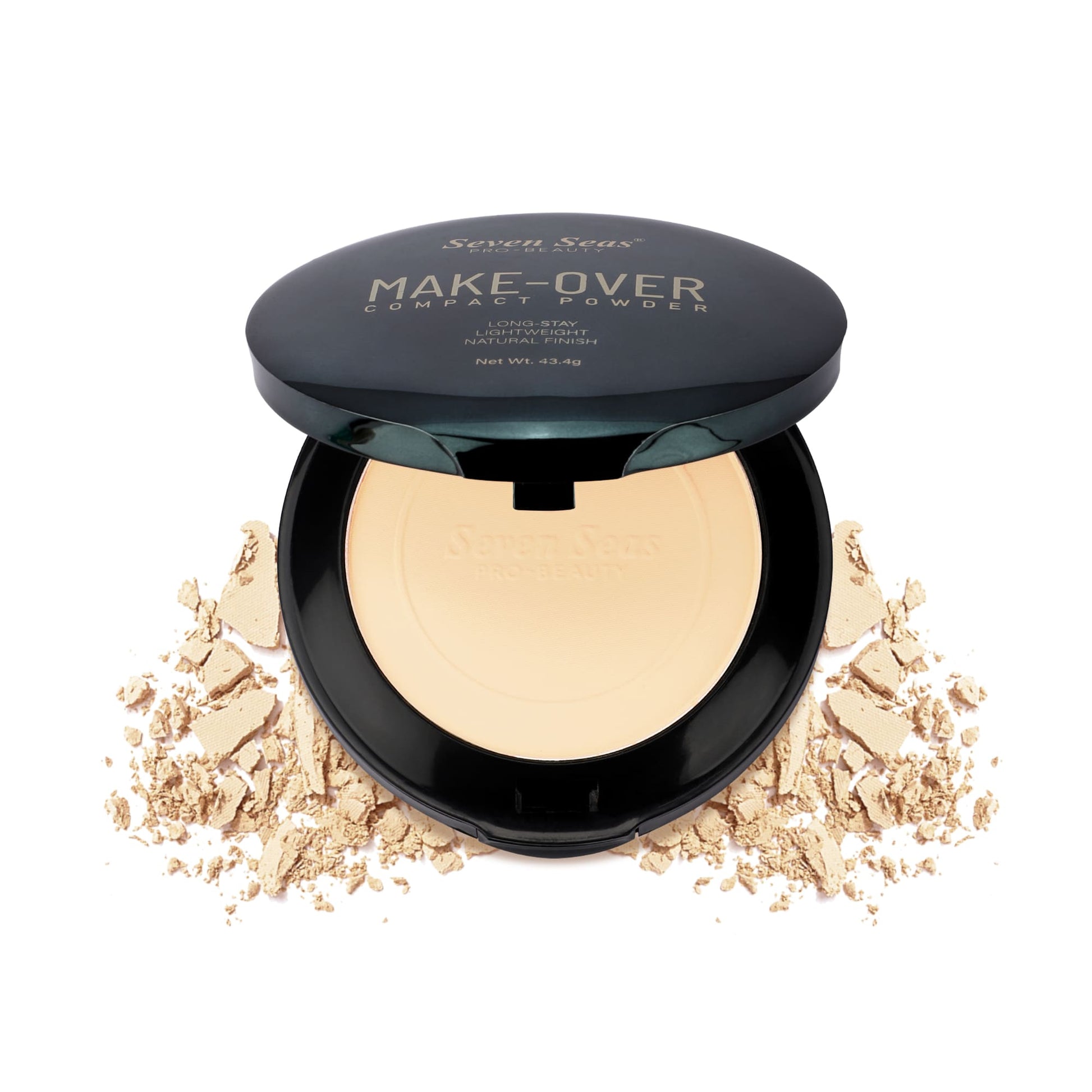 Make-Over compact powder with open case and scattered powder on a white background