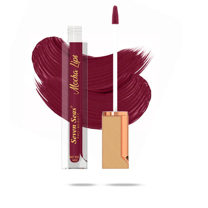 Mocha Lips liquid lipstick with rich burgundy swatch, sleek gold applicator, and transparent tube design