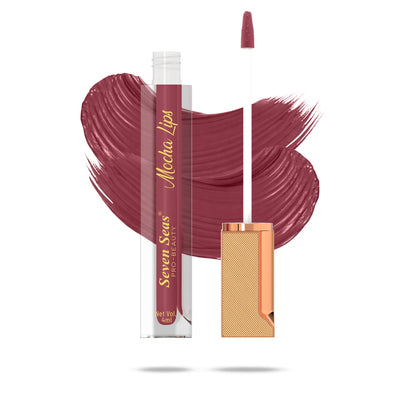 Mocha Lips liquid lipstick with rich maroon swatch, sleek gold applicator, and transparent tube design