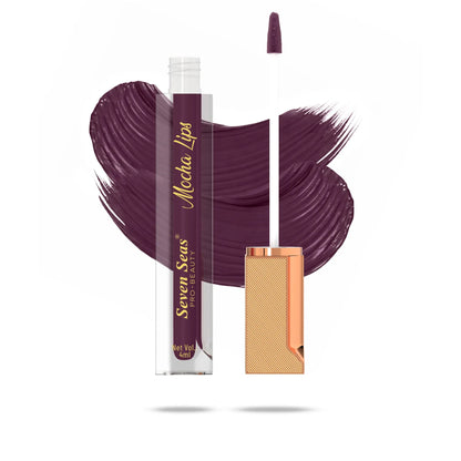 Mocha Lips liquid lipstick with rich purple swatch, sleek applicator, and gold packaging
